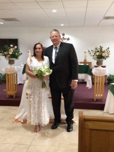 Image of couple in church on wedding day