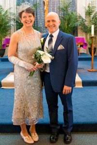 Image of couple on wedding day in front of altar in church