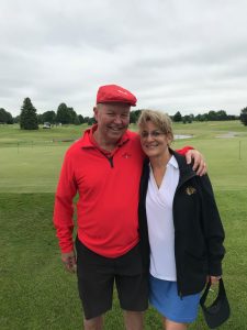 Image of couple on golf course