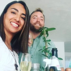 Image of couple toasting together