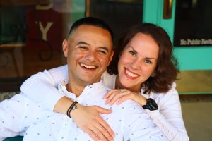 Image of couple smiling at the camera