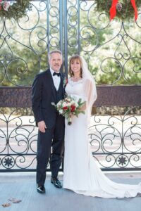Image of bride and groom in wedding attire