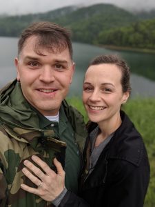 image of couple by water